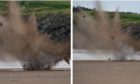 The controlled explosion on Carnousite beach. Photos and video by Courier photographer Kim Cessford.