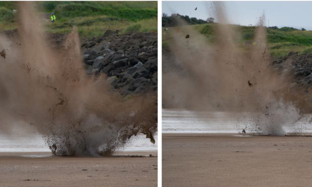 The controlled explosion on Carnousite beach. Photos and video by Courier photographer Kim Cessford.