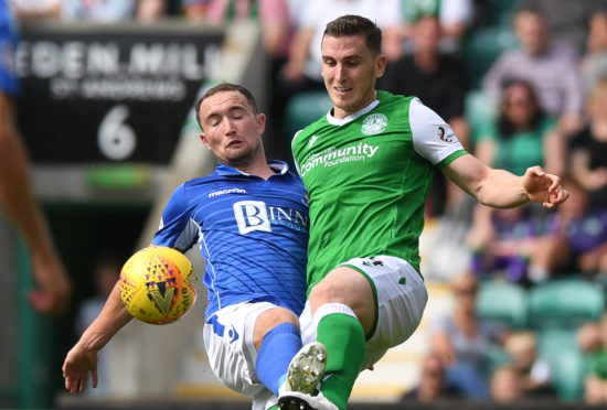 Chris Kane and Paul Hanlon in action.