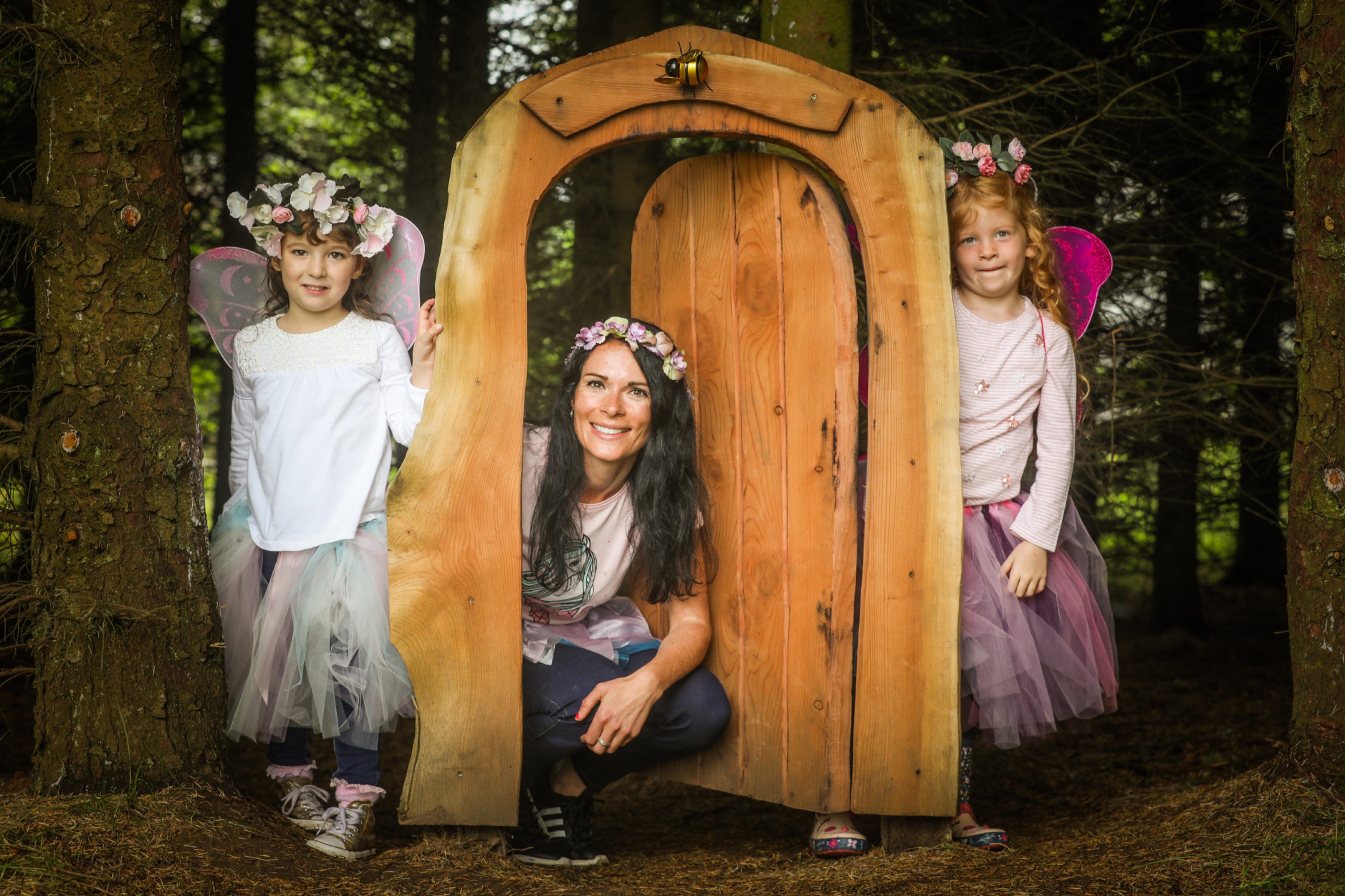 Gayle and her cute little fairy friends enjoy Brechin Castle's Fairy Trail.