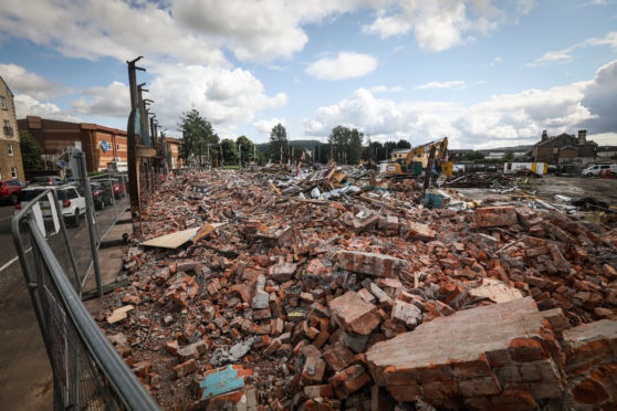 Demolition work has started on the former council offices at The Atrium in Perth to make way for a large-scale care home