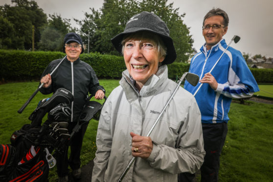 Bill Radcliffe (organiser) Jim Granger, Charity Nominator and Mary Radcliffe (organiser) at the club.