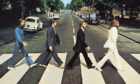 The iconic Abbey Road album cover image taken by Dundee photographer Iain Macmillan on August 8, 1969