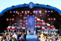 The teams take the stage at the Opening Ceremony of the Solheim Cup.