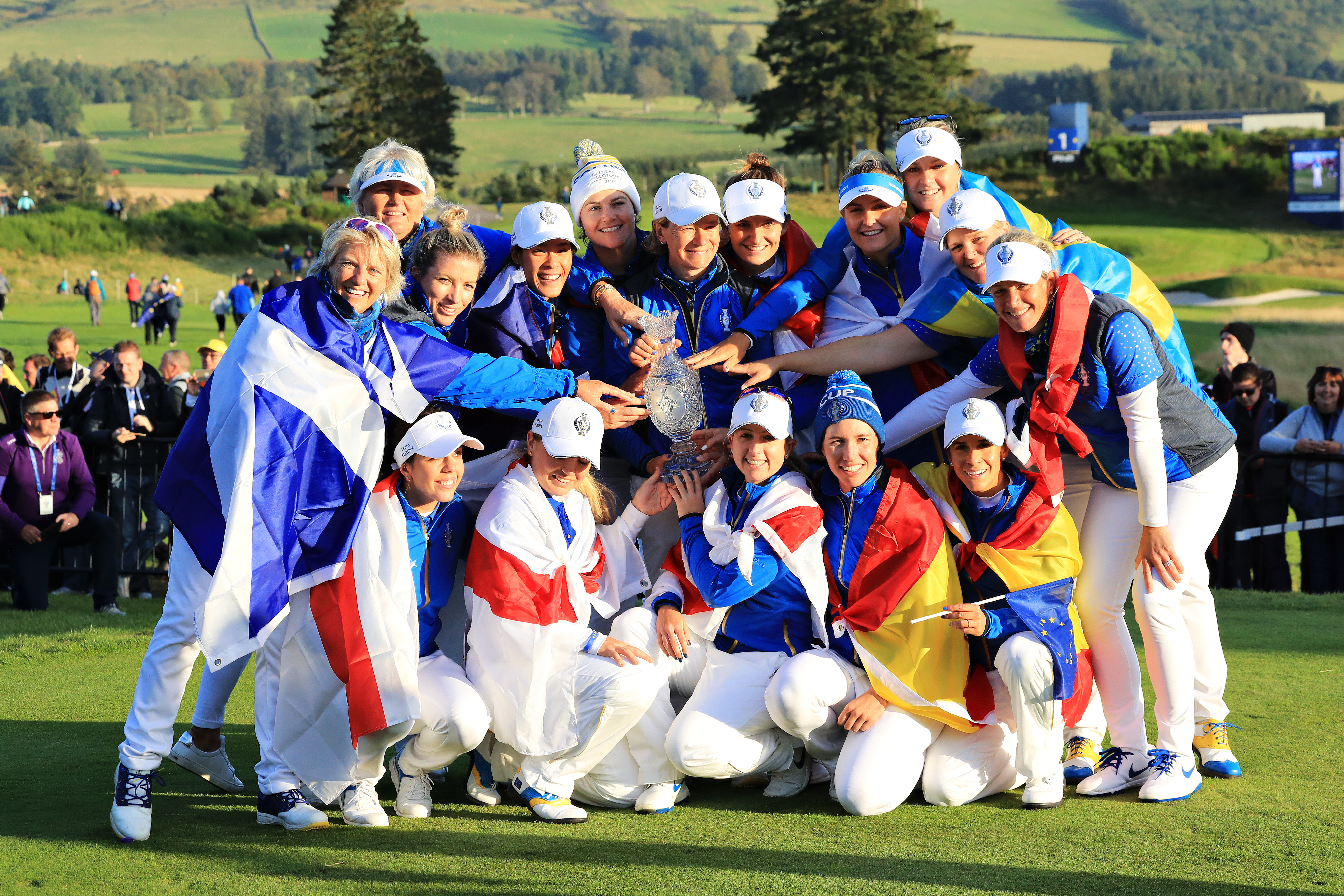 The victorious European team with the Solheim Cup.