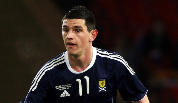 Graham Dorrans in action for Scotland.