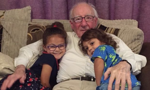 William Dye, known as Bill, with his two youngest grandchildren Laila and Kalibo