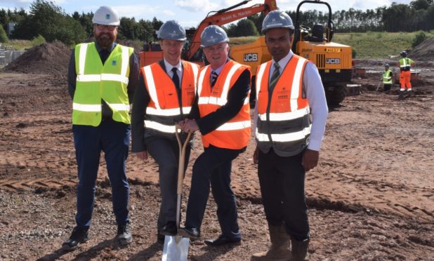 The photo Perth and Kinross Council didn't want you to see... (L-R) Richard Welch, PKC; Scott Petit, Barratt Homes; Cllr Peter Barrett; Brendan Saba, Barratt Homes