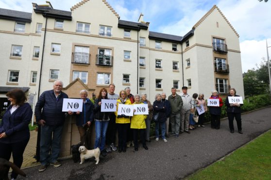 A silent protest was held at Abbey Park before councillors rejected plans for a hotel and student accommodation.
