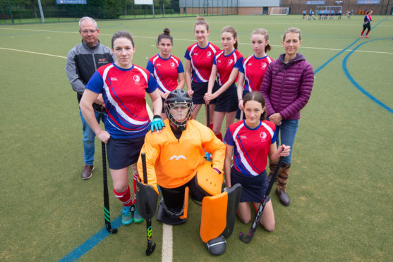 Members of Madras FP Hockey Club and parents, from left Neil Miller, Jade Milne, Louisa Miller, Mandy Bateman, Isla Bell, Rosie Bell, Grace Holden, Amy McClymont and Helen Holden.