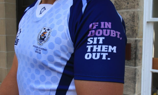 New rugby kits with "If In Doubt, Sit Them Out" logo at Dollar Academy
