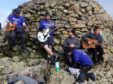 Emerald Sunday's Matthew Fleming, Scott Crawford Andrew Taylor, singer Mike Martin and Alan Hunter on the summit of Ben Nevis.