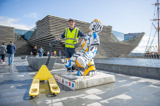 Neil Cooney with one of the Oor Wullies outside the V&A. Picture by Kim Cessford.