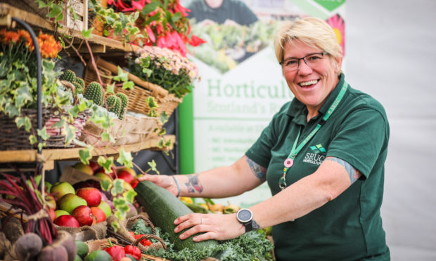 Heather Munro setting up the SRUC Elmwood display at Dundee Flower and Food Festival.