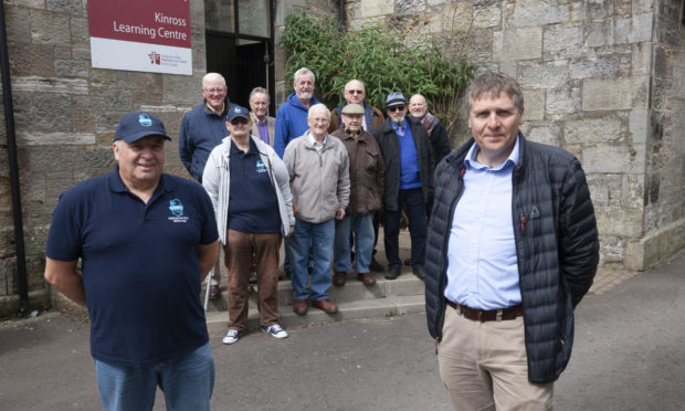 Councillor Watters, right, and the Kinross Mens Shed group are delighted with the success.