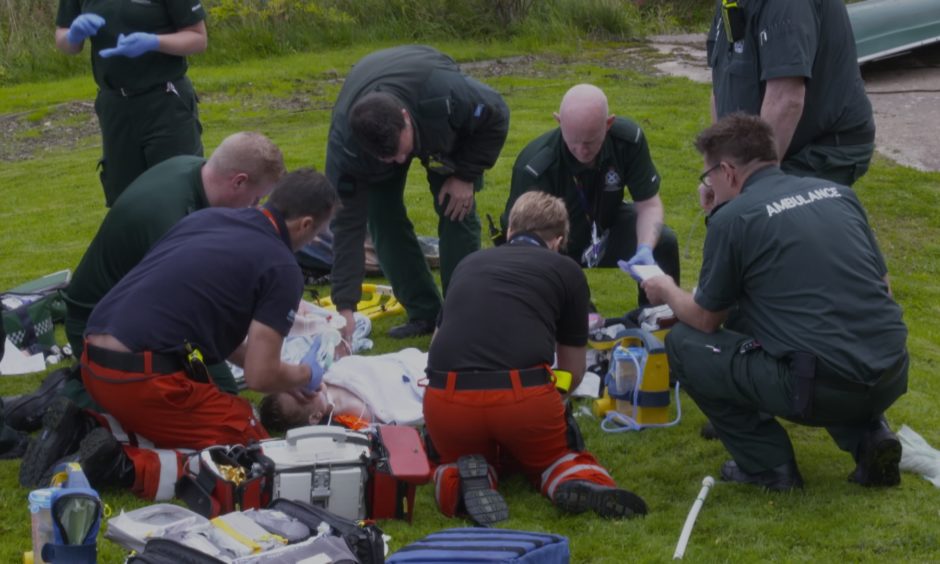 Paramedics working on little Felix after he was pulled from a loch