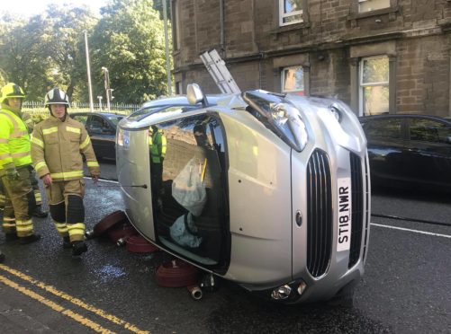 The Ford on its side. Picture by Susan Smith.