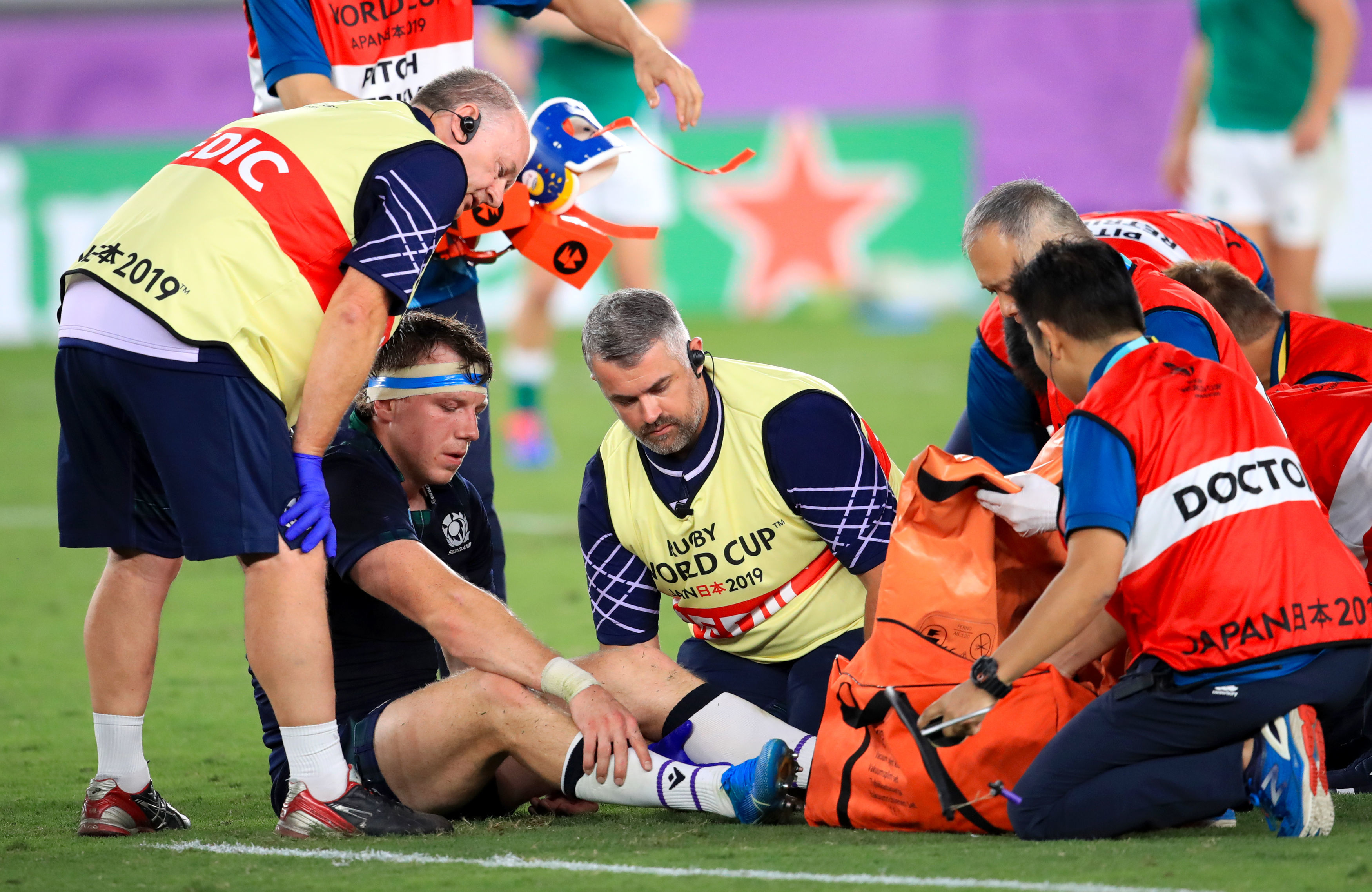 Scotland's Hamish Watson receives medical attention during the 2019 Rugby World Cup Pool A match.