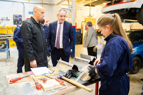 Picture Shows (l-r) Lecturer Ricky Neil and Cabinet Secretary Richard Lochhead. Picture by Kim Cessford.