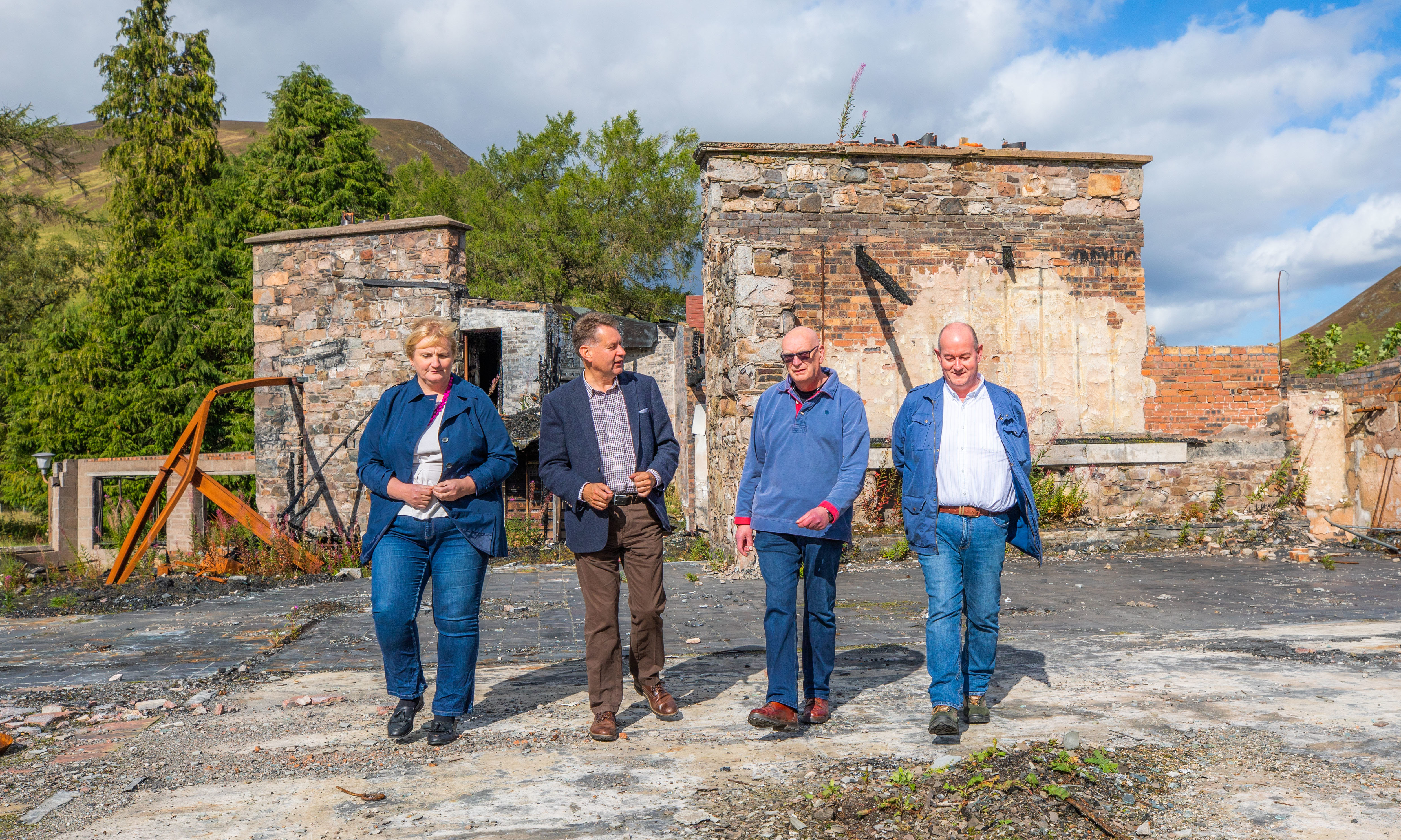 Murdo Fraser, second from left, has called on Perth and Kinross Council to step in and take control at the Spittal of Glenshee Hotel site.