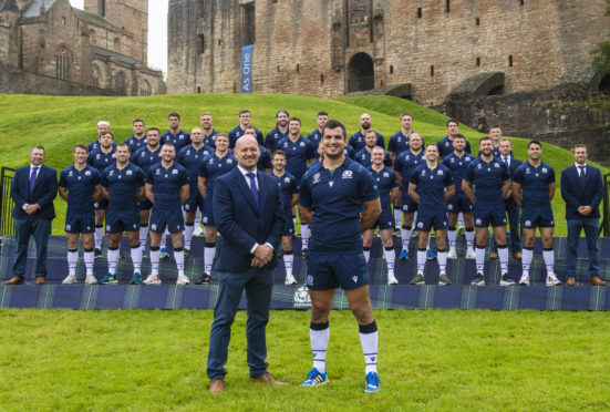 Scotland head coach Gregor Townsend and captain Stuart McInally pose in front of the squad during an announcement of the Scotland squad for the Rugby World Cup.