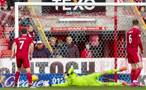 Aberdeen keeper Joe Lewis can't keep out Michael O'Halloran's shot.