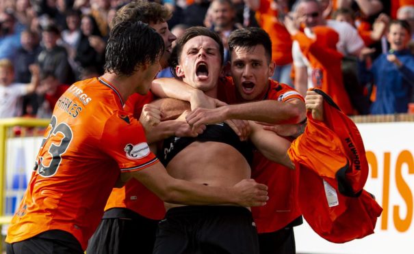 Lawrence Shankland celebrates his winner.