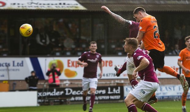 Lawrence Shankland heads home the winner in stoppage-time.