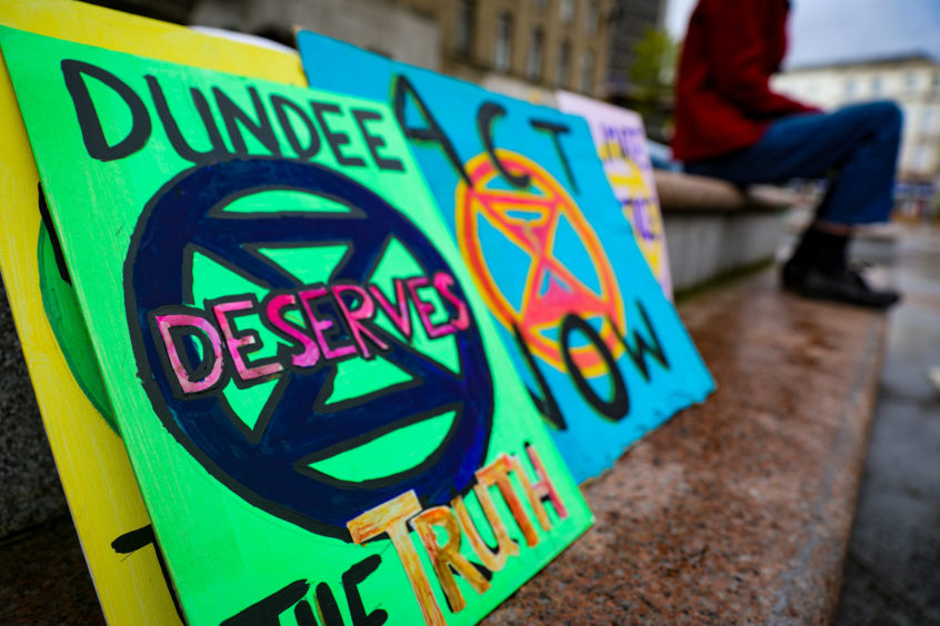 Courier - Evening Telegraph - News - Jon Brady / Scott Milne - Extinction Rebellion Climate Change protest story - CR0013644, CR0013646, Cr0013647 - Dundee - Picture Shows: Banners and flags from the Climate change protest in Dundee - Monday 2nd September 2019 - Steve Brown / DCT Media