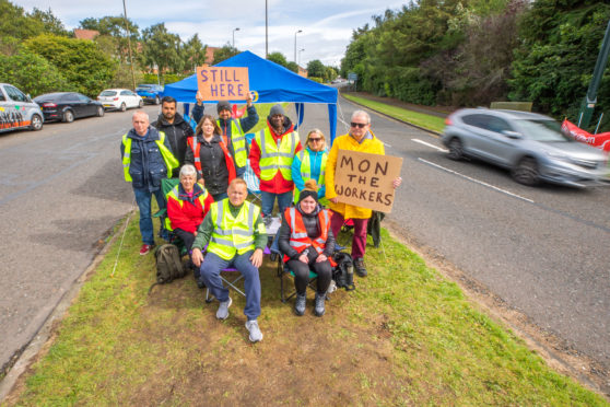 The workers will continue to stay on the picket line until the dispute is resolved.