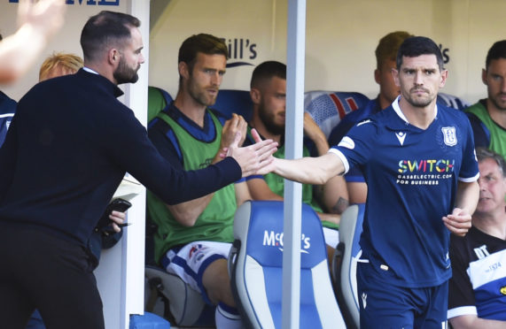 Dundee manager James McPake gives Graham Dorrans his debut.