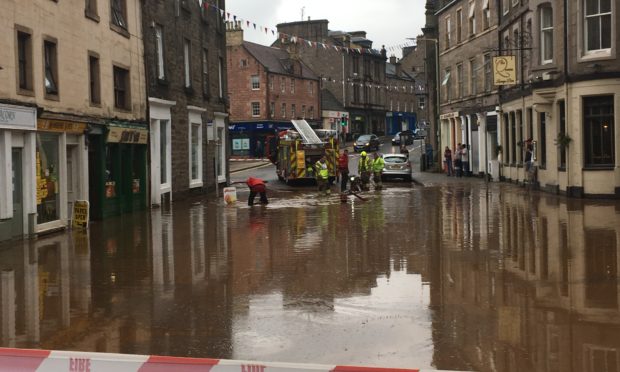 A flash flood hit Forfar town centre in September.