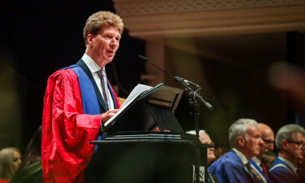 Jim Spence on stage making his address as he is officially named Dundee University rector.
