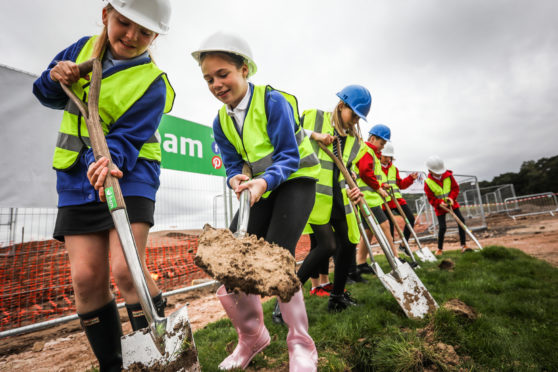 Young pupils cut the first turf at the new Madras project
