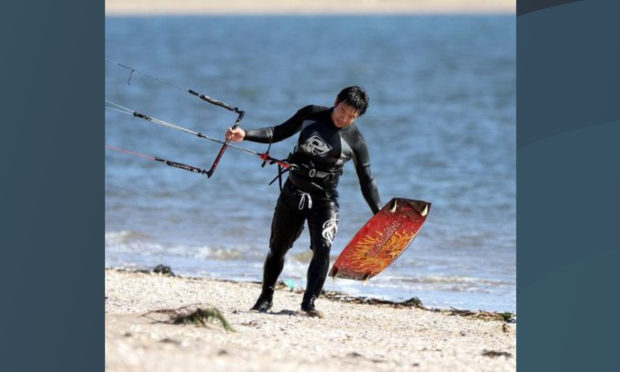 Raymond Cheng kitesurfing in 2012.