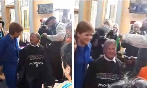 David Torrance getting his hair cut in Holyrood.