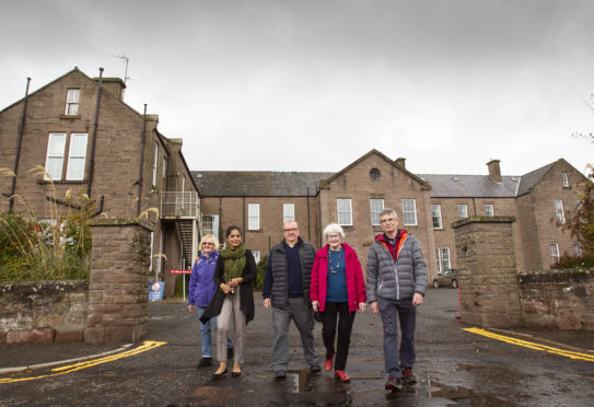 From left, Jean Clark, Nilima Puthu, Dick Robertson, Moira Robertson and Graeme Lockhart outside Brechin Infirmary.