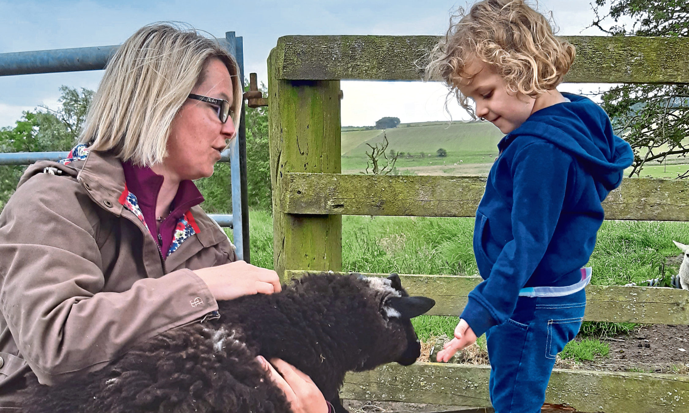 Helping out on the farm at Craigduckie.