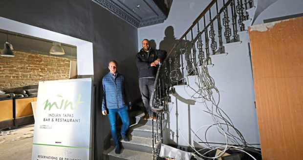 Associate Douglas Sturrock and Jon Frullani inside the new premises of Jon Frullani Architects, on the Perth Road in Dundee.. 
Dougie Nicolson / DCT Media.