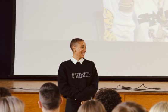 Adwoa Aboah delivering her talk to pupils.