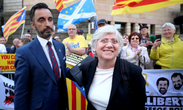 Clara Ponsati and her lawyer Aamer Anwar with supporters outside Edinburgh Sheriff after her preliminary hearing in March 2018