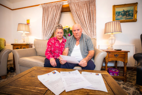 Joseph and Annette Stewart with responses to their letters to local politicians. Picture credit Steve MacDougall.