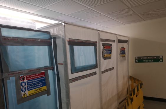 An asbestos warning in Ninewells Hospital.