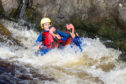 Gayle goes tubing on River Tummel.