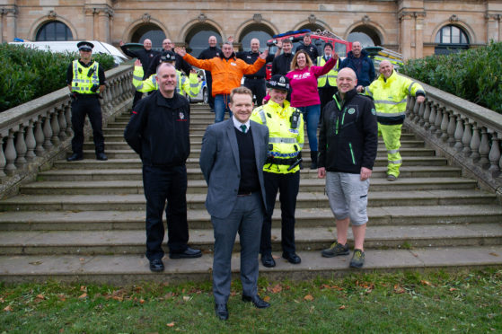 Representatives of the organisations that are preparing for the public fireworks displays in Dundee with front - l to r - David McKenzie (Fire Service Local Authority Liaison Officer for Dundee City), Councillor Alan Ross (Convenor City Development), Inspector Kerry Lynch and Councillor Kevin Cordell (Convenor Community Safety and Public Protection), at Baxter Park Pavilion.