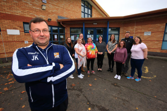 Jon Kidd and the community board members outside the Letham Community Hub