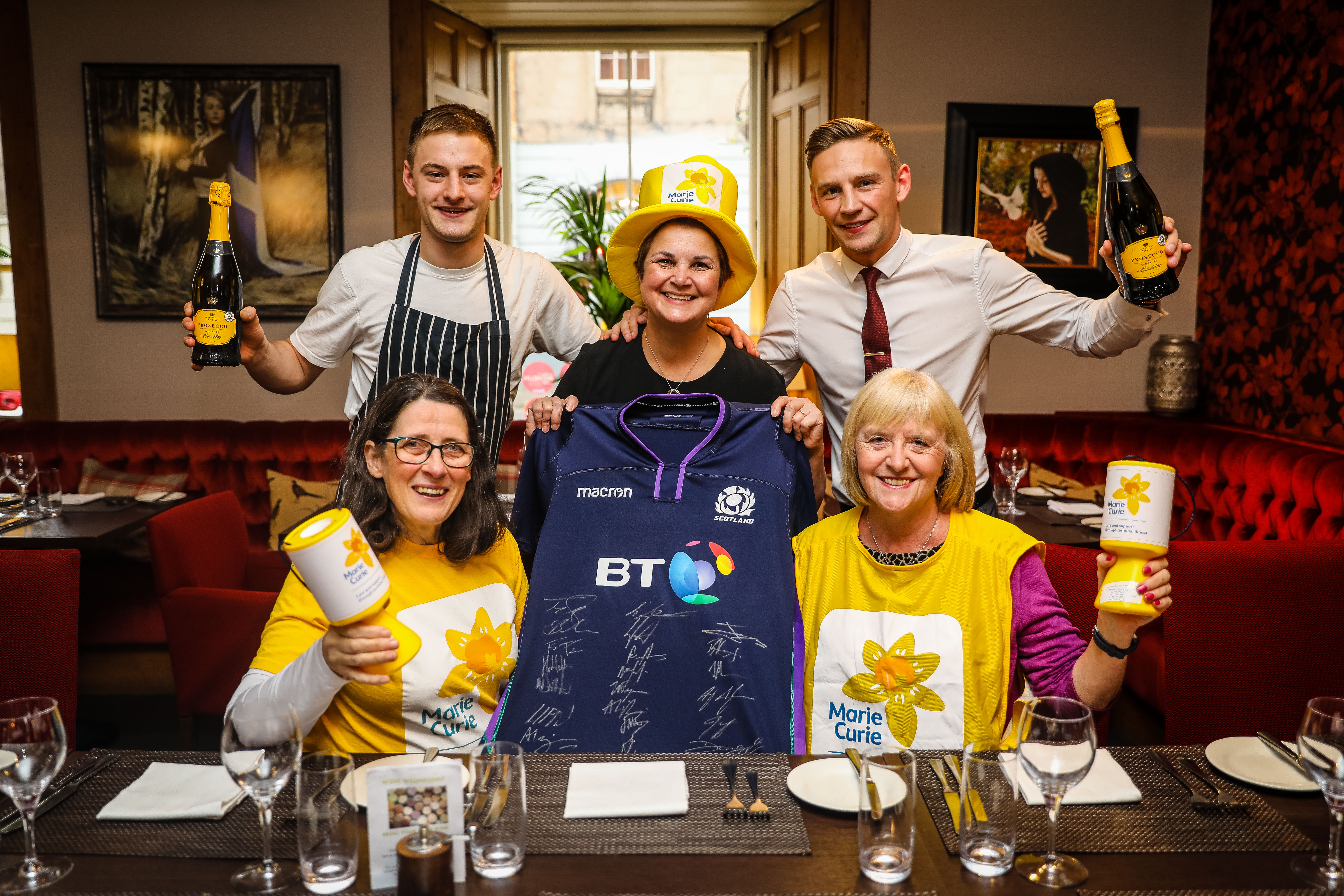 Picture Shows: (Back) Jamie Deans (Head Chef), Martine Sinclair (53), Lee Deans (Owner) and (Front) Alyson Johnston and Marion Thomson from Marie Curie. Picture credit Steve Brown.