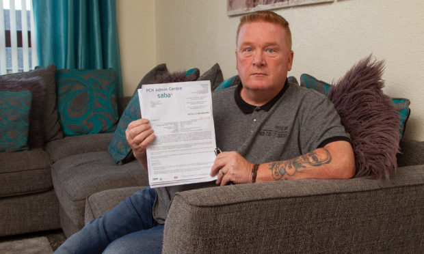 Stephan Millar, who suffered heart attack and was taken to Ninewells Hospital, .got a parking ticket after his family car was parked at the hospital car park.