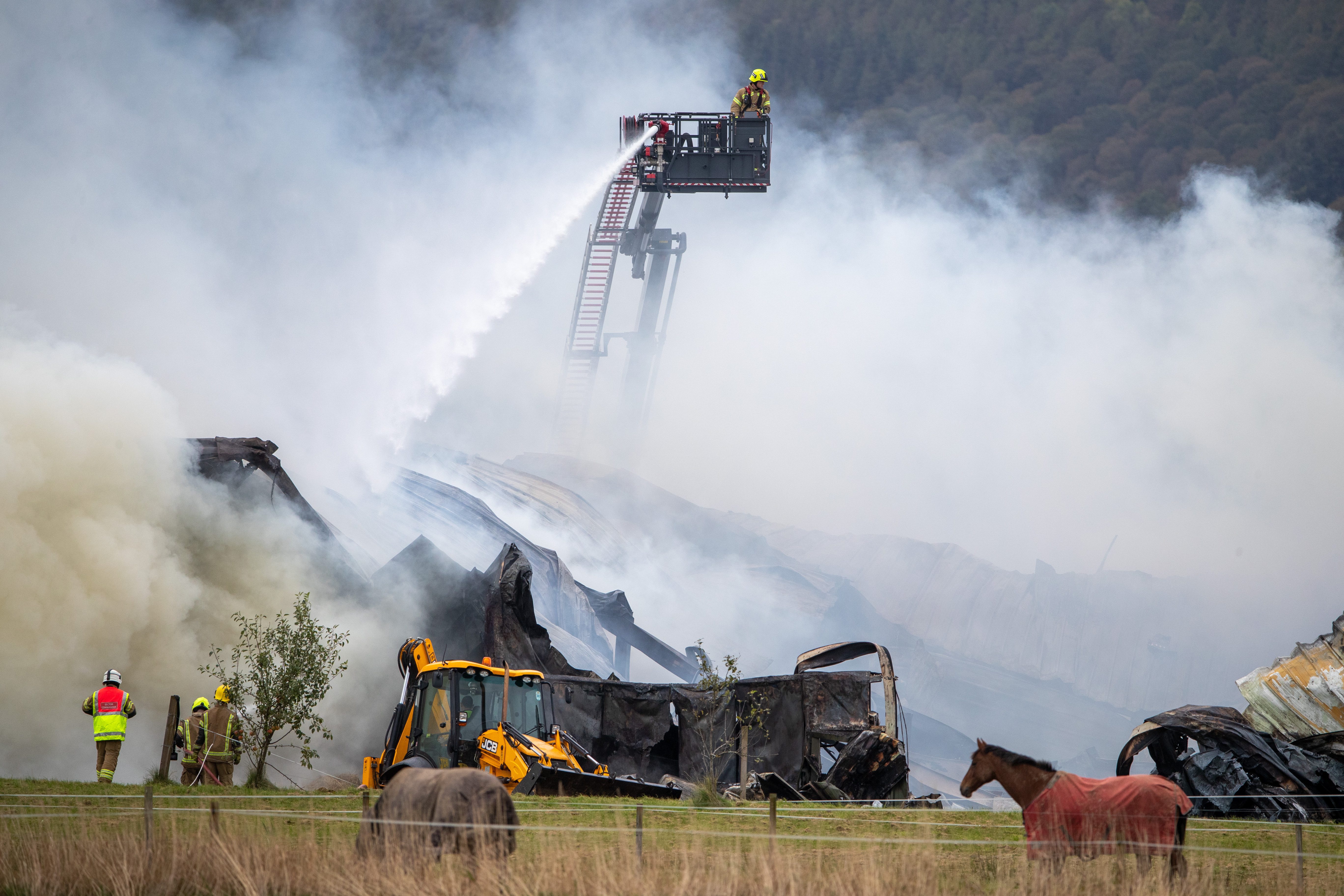 Firefighters fight a huge blaze at Netherton Equestrian Centre, Aberargie.