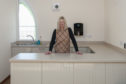Marion Brownlie Property Convenor, in the new kitchen.